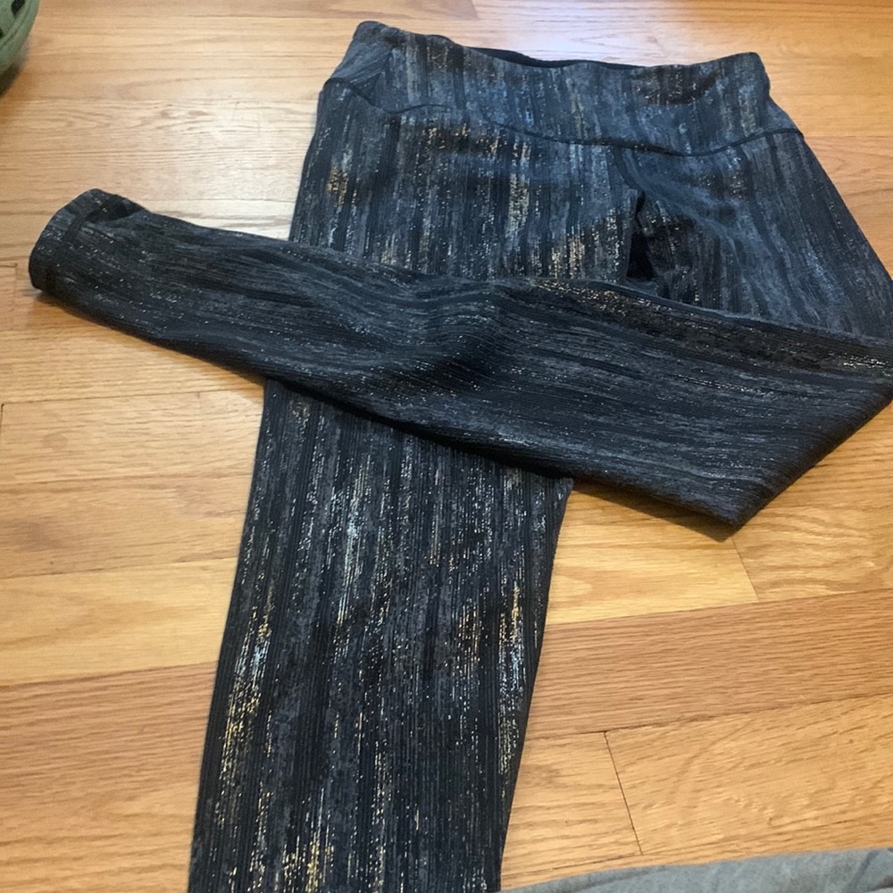 Victoria secret leggings. Thick fabric. small. Black, grey and gold stripped.